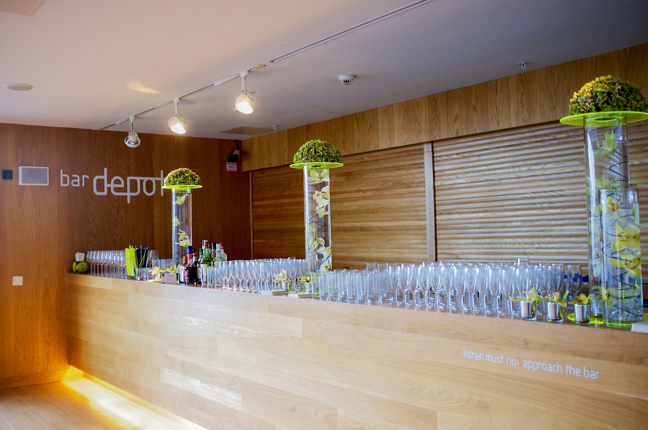 Bardepot's Bar area covered in glasses of different sizes