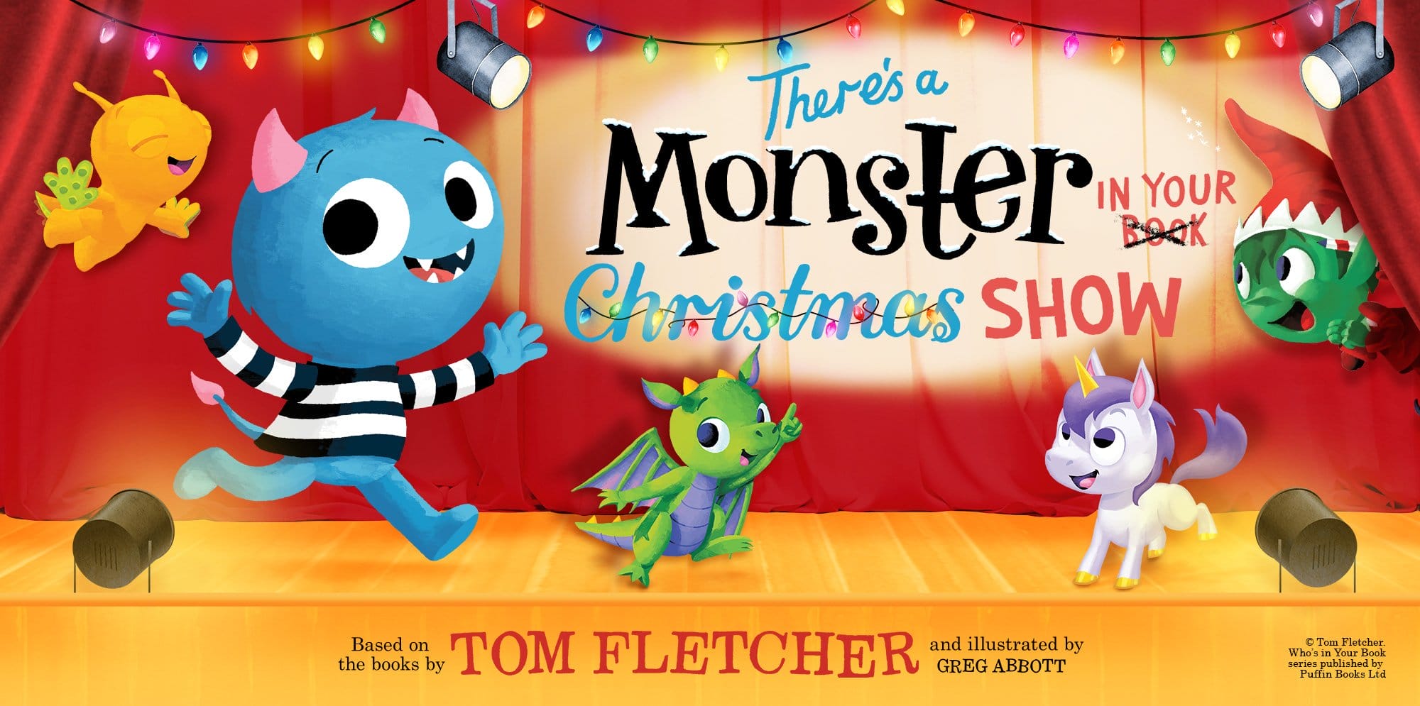 Cartoon creatures including a unicorn, dragon, alien, elf and a monster stand of a stage. Text reads ' There's a Monster in your Christmas Show