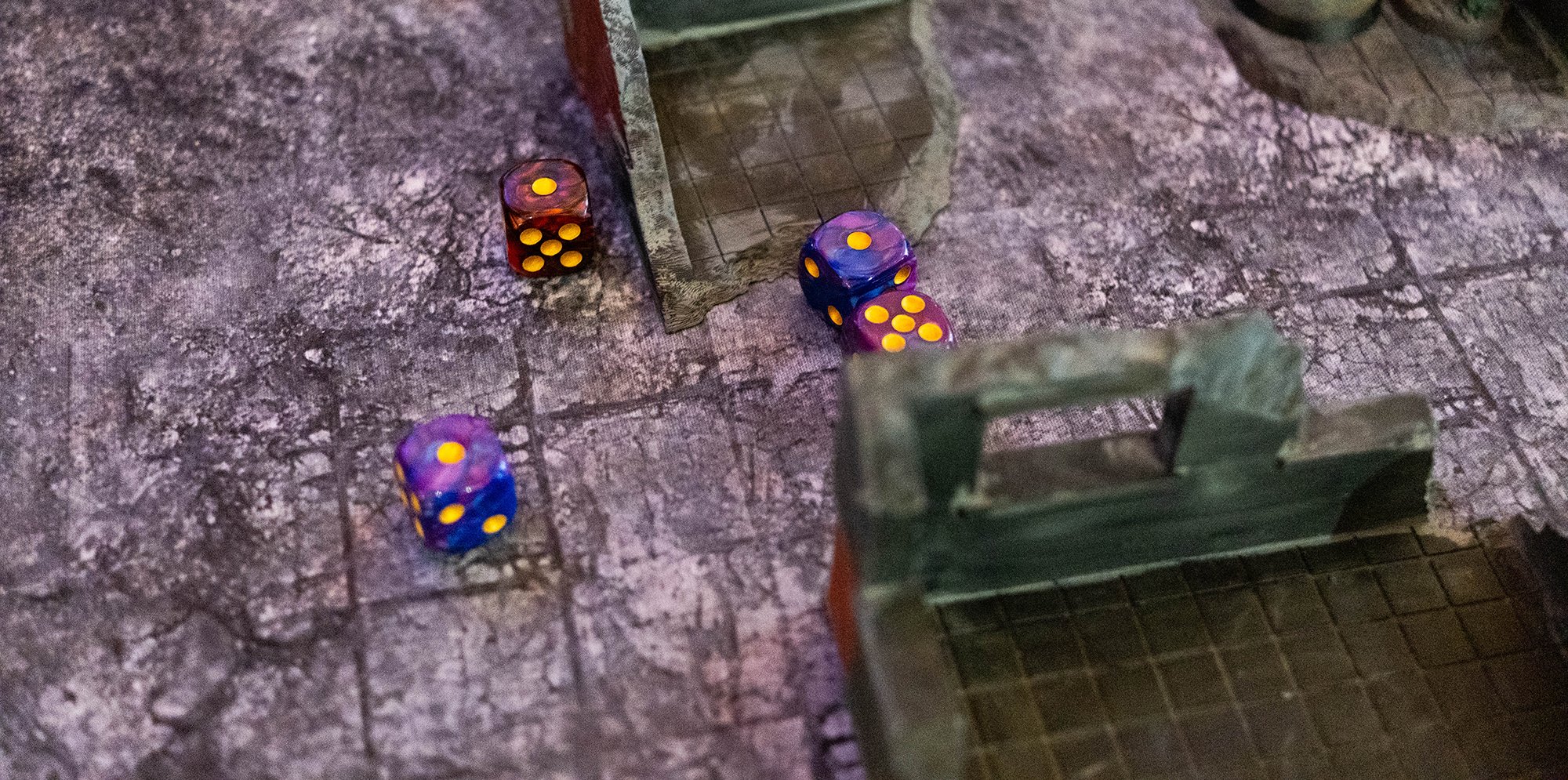 Tabletop gaming terrain with dice rolled over it