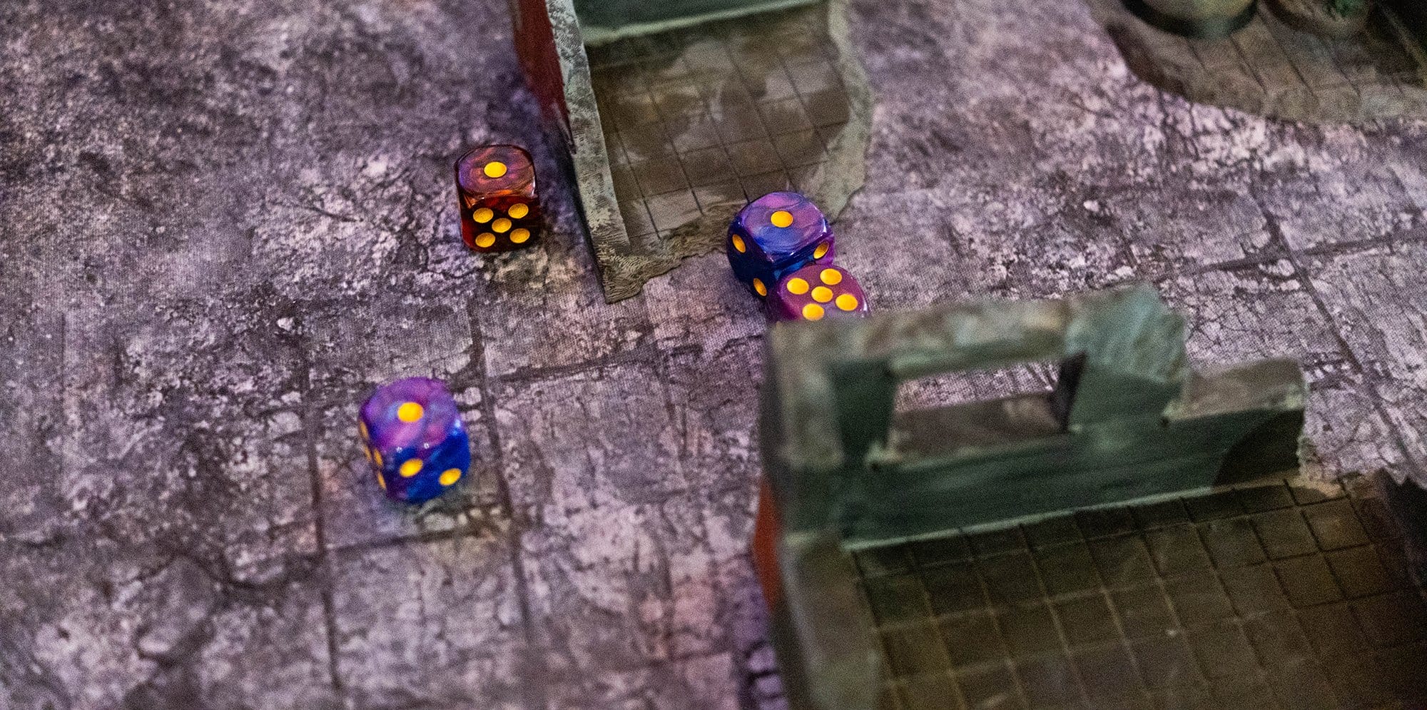 Tabletop gaming terrain with dice rolled over it