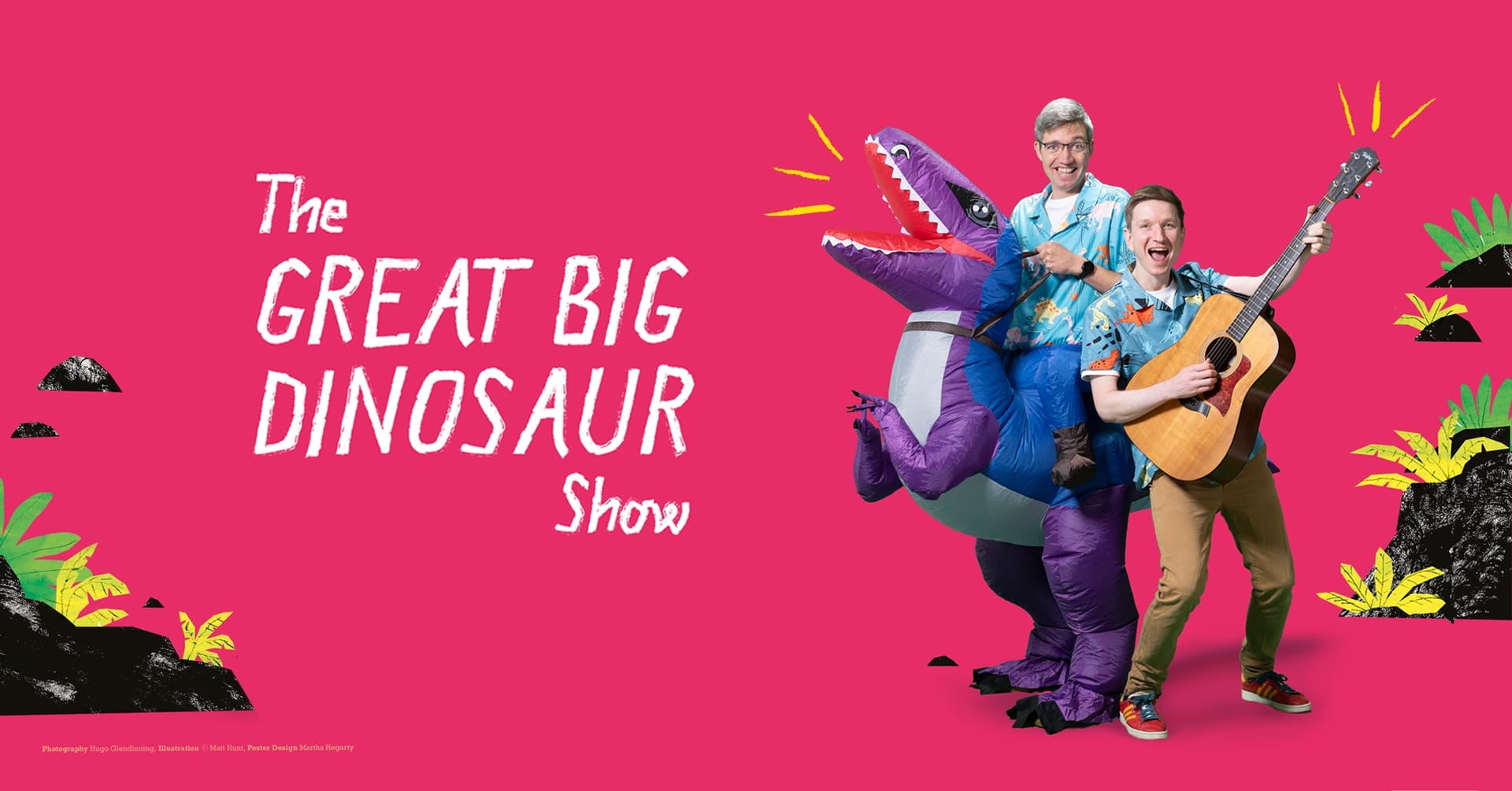 Against a bright pink background Simon Mole, wearing a dinosaur suit, and Gecko, playing an acoustic guitar, stand back to back. White text on the image reads The Great Big Dinosaur Show.