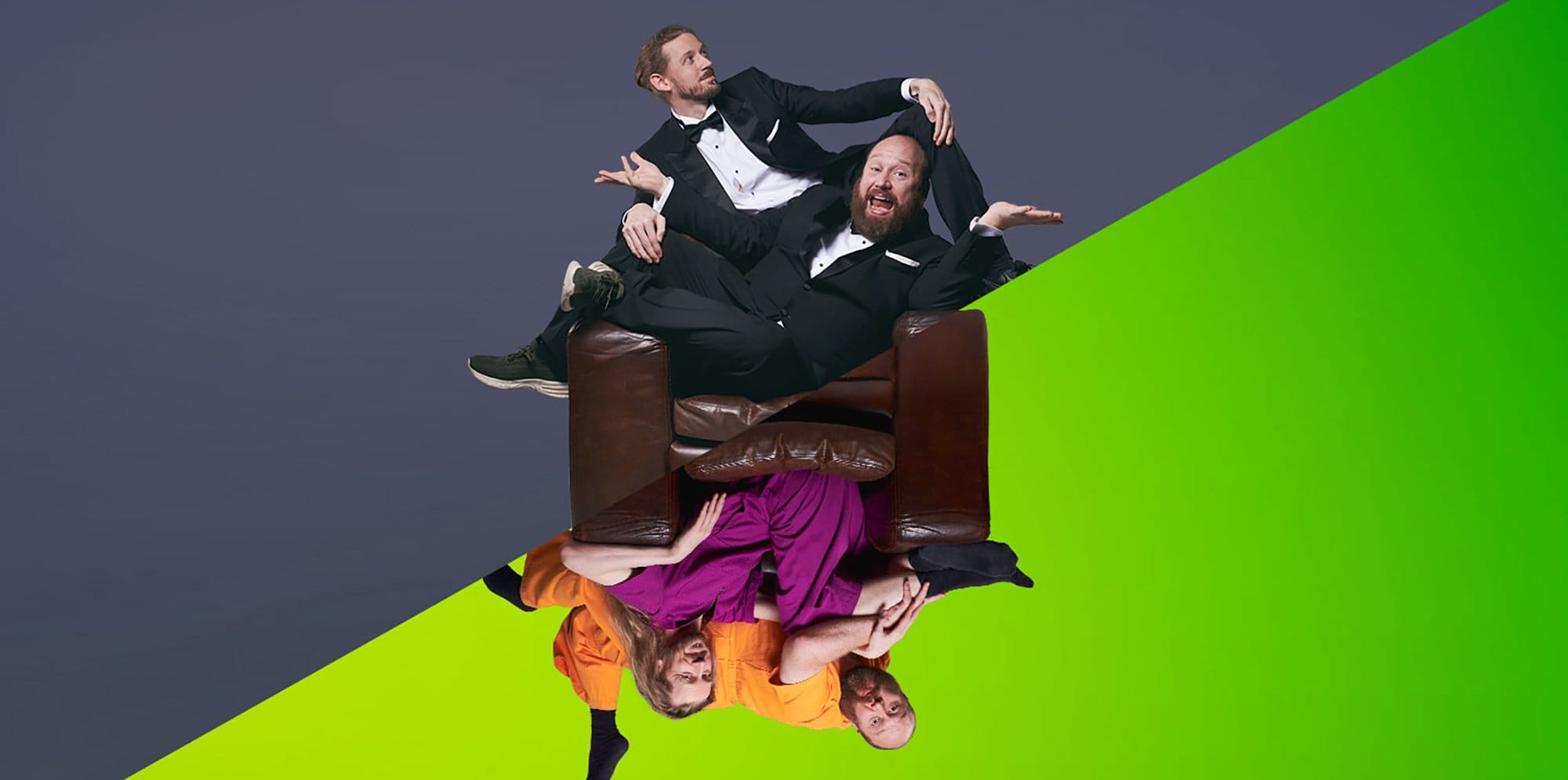 The members of the comedy group Jonny Baptists in a split image, on one side they wear tuxedos and the other in comfy vibrant clothing while laying over a leather chair