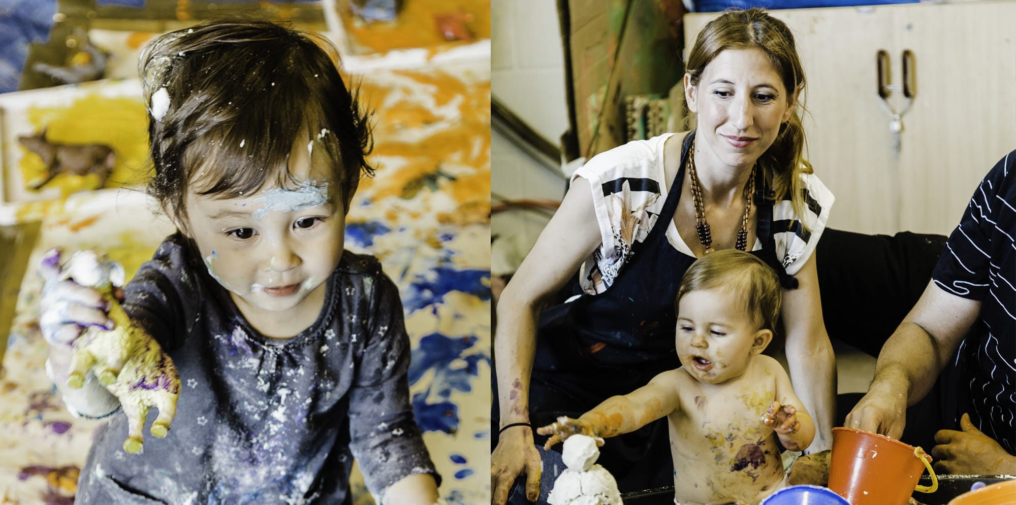 Smiling babies engage in messy play with blue and yellow paints