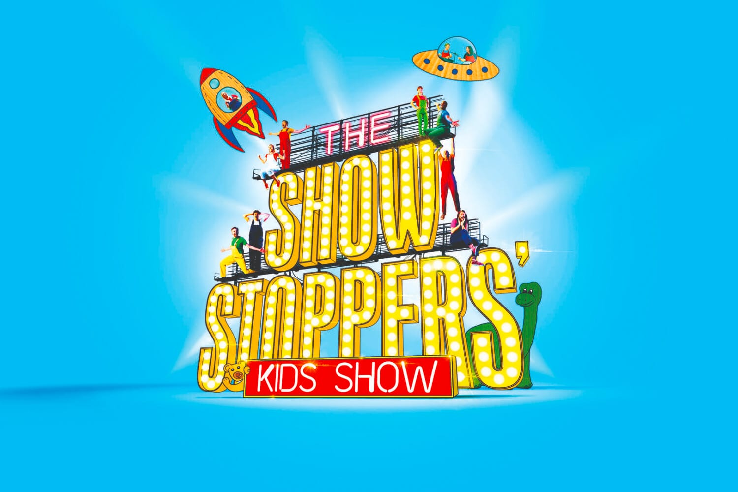 Dynamic typography reads: The Show Stoppers Kids' Show against a bright blue background. Flying out from the text in the centre are rocket ships, flying saucers, dinosaurs and more.