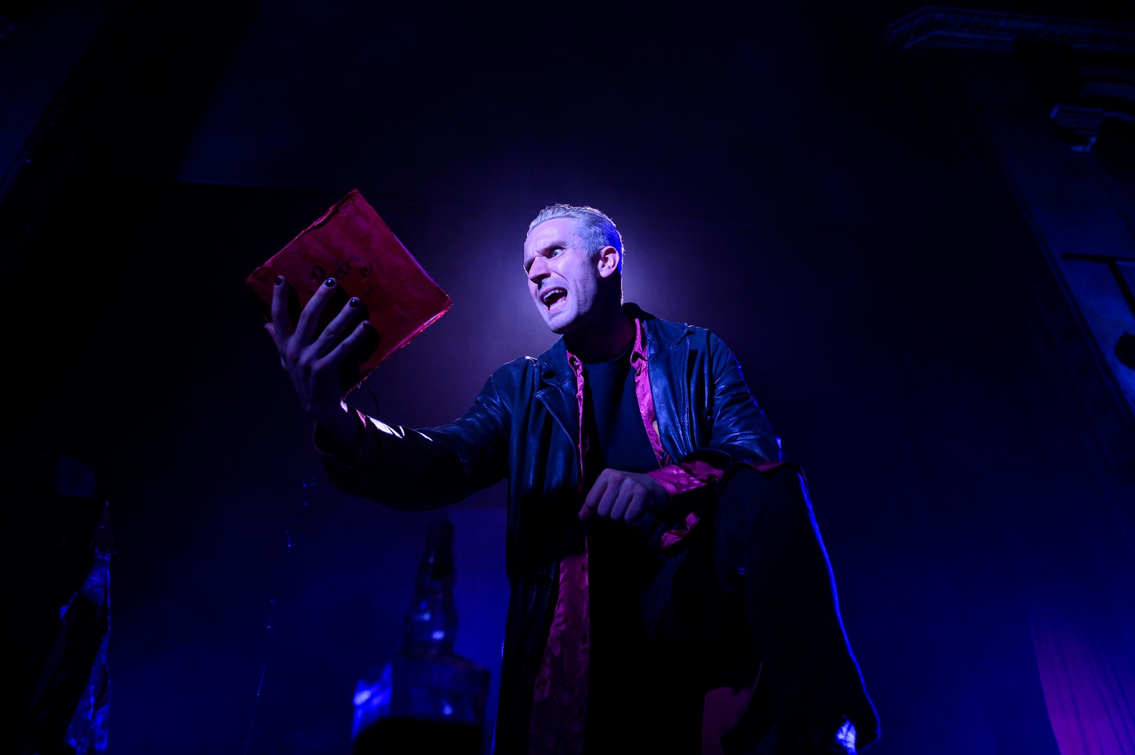 Spike reading a text in a dramatic manner.