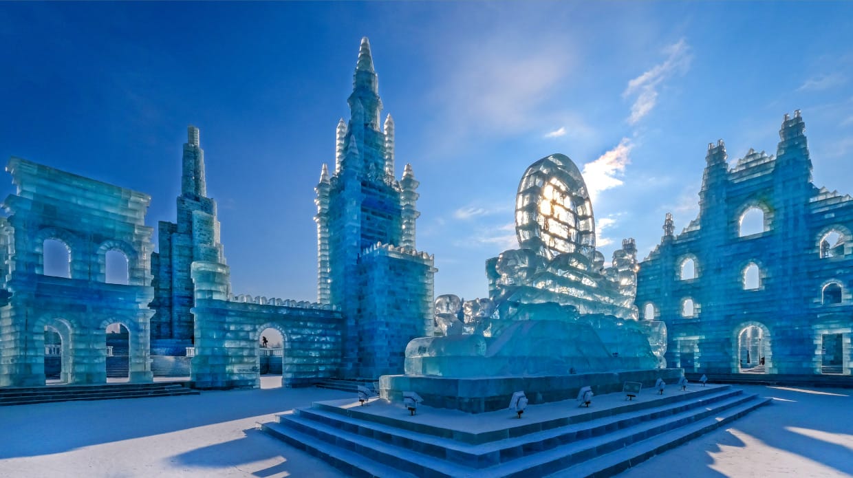 An image taken outside of a building constructed from blocks of ice.