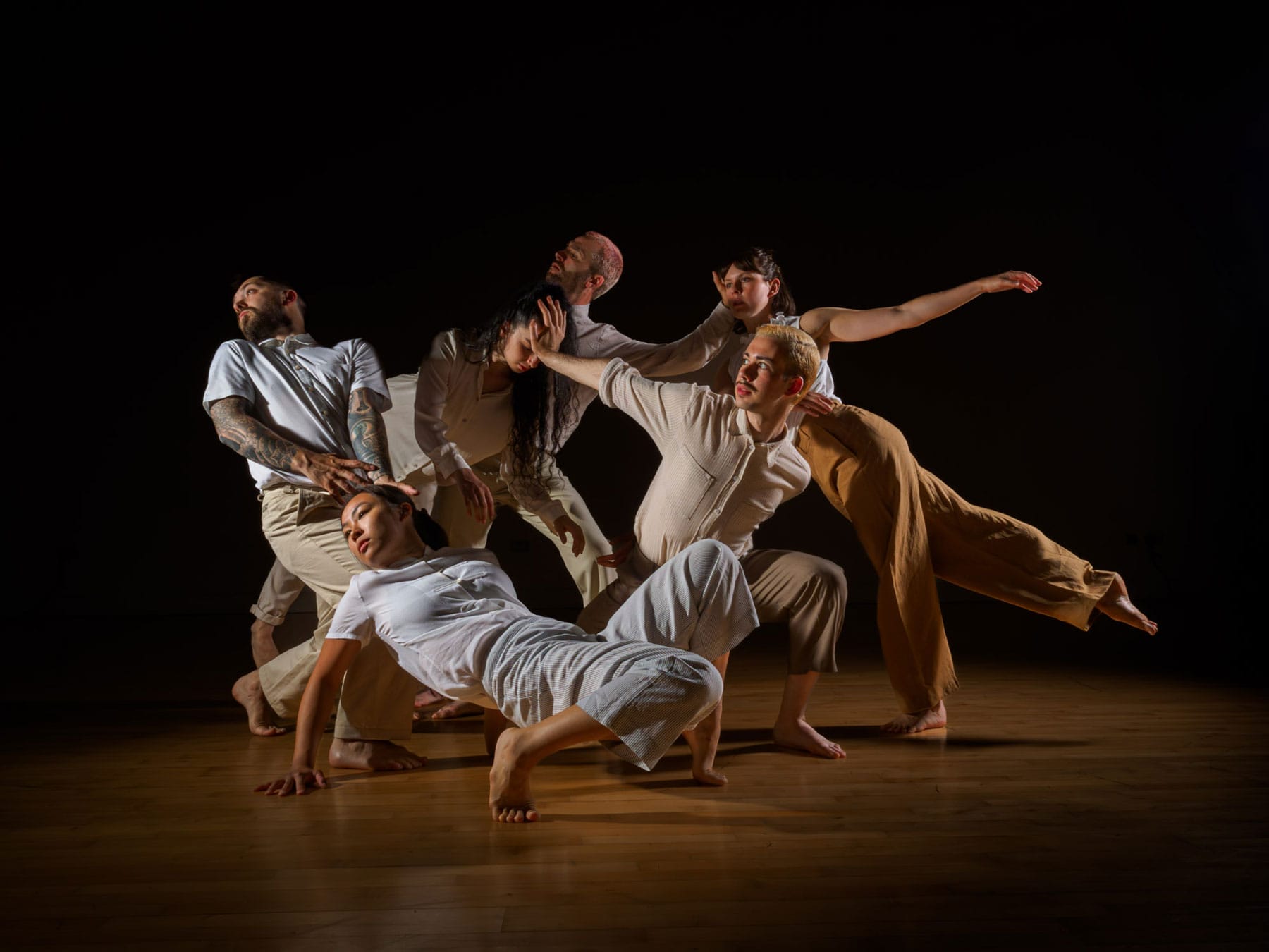 Production photo. A group of dancers on stage.