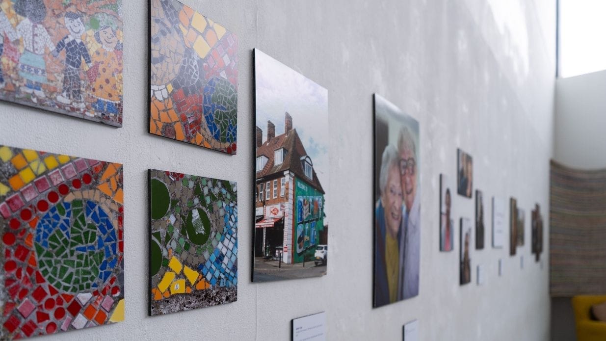 Photographs displayed on the white gallery walls of artsdepot's Apthorp Gallery.